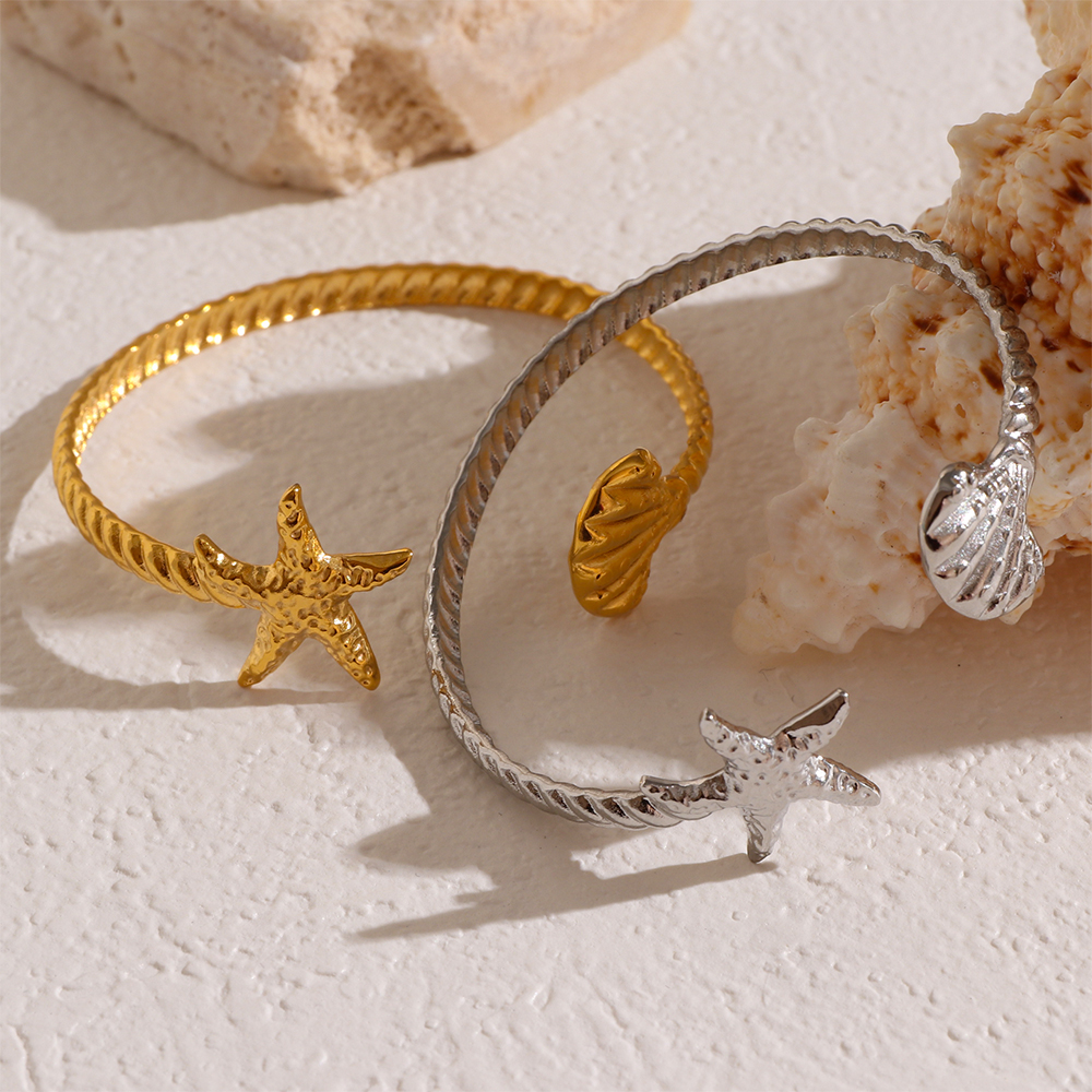 Ocean Inspired Stainless Steel Bangles with Seashell Starfish and Crab Motifs