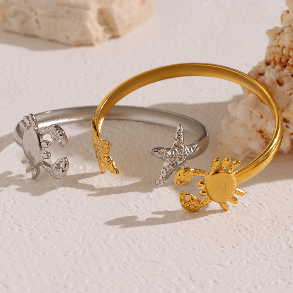 Ocean Inspired Stainless Steel Bangles with Seashell Starfish and Crab Motifs