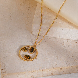 This circle stone necklace is a symbolic piece of jewelry that beautifully represents life’s journey. Designed with a polished golden ring and three delicate leaf-shaped inlays, it combines natural stones, quiet luxury, and deep meaning, making it an unforgettable accessory or gift for any occasion.