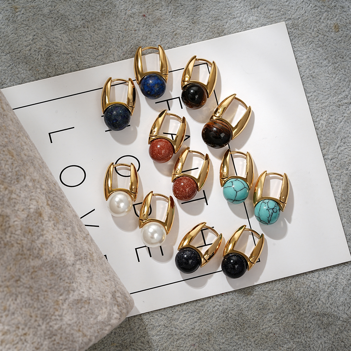 Sculptural U Shape Hoop Earrings Adorned with Stone Bead