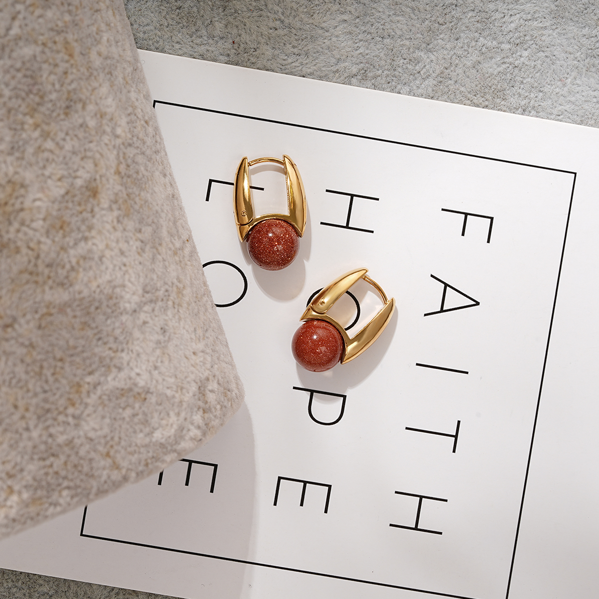 Sculptural U Shape Hoop Earrings Adorned with Stone Bead