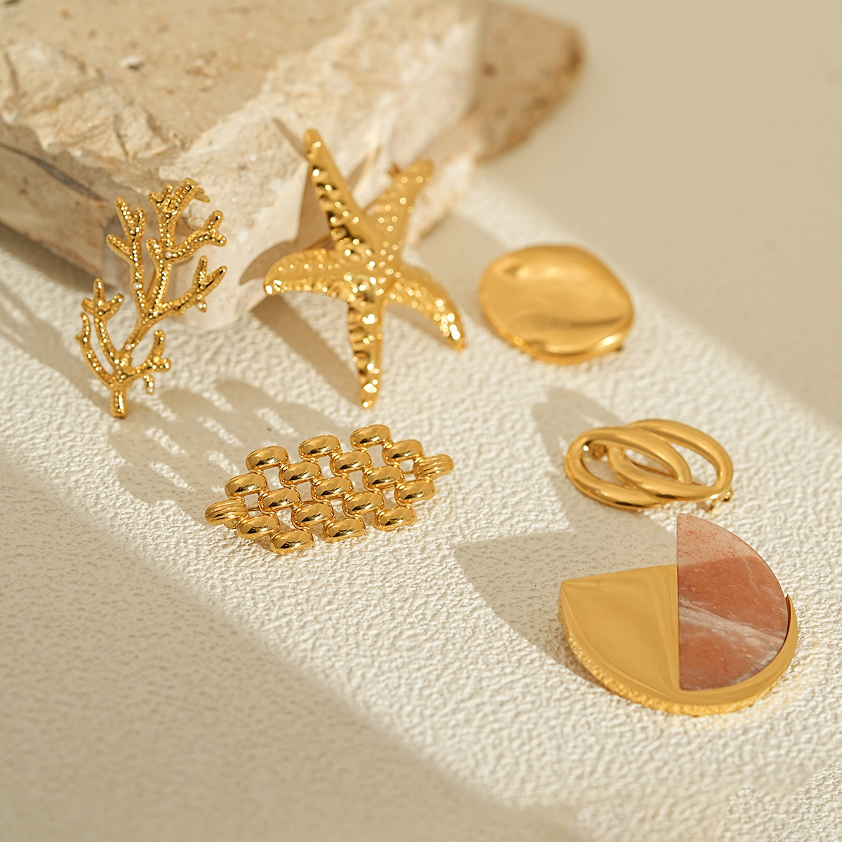 Contemporary Geometric and Organic Shape Gold Brooch Collection