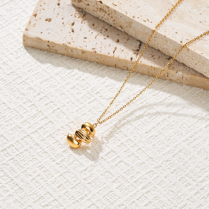 18K Gold Plated Stainless Steel Necklace with Sculptural Pendants