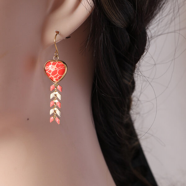 Charming Heart Shaped Drop Earrings with Playful Irregular Dot Design