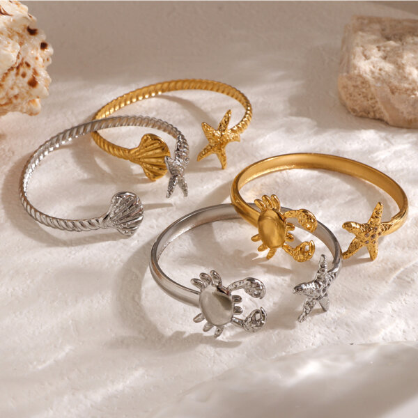 Ocean Inspired Stainless Steel Bangles with Seashell Starfish and Crab Motifs