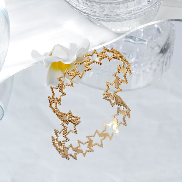 Elegant 18k Gold Star Cuff Bracelet with Hollow Celestial Design