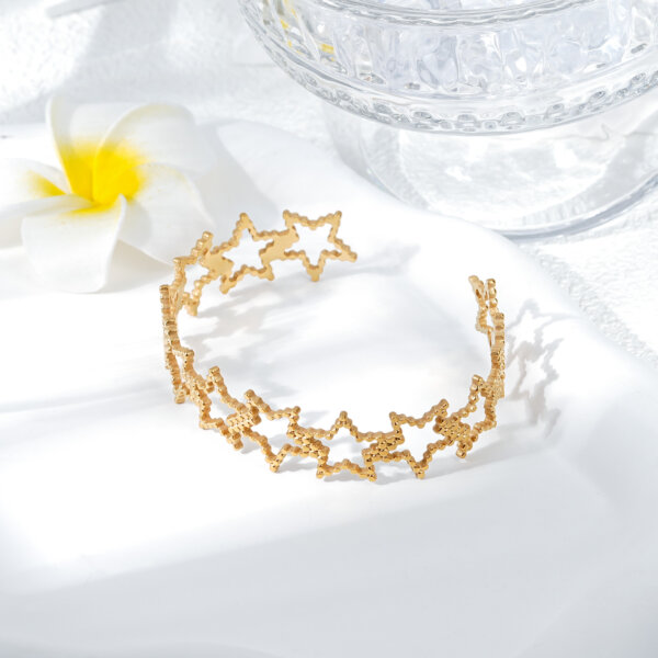 Elegant 18k Gold Star Cuff Bracelet with Hollow Celestial Design
